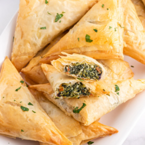 pinterest image for spinach feta and sundried tomato phyllo triangles