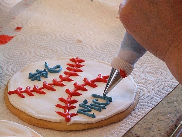 How to Make Baseball Cookies : adding royal icing