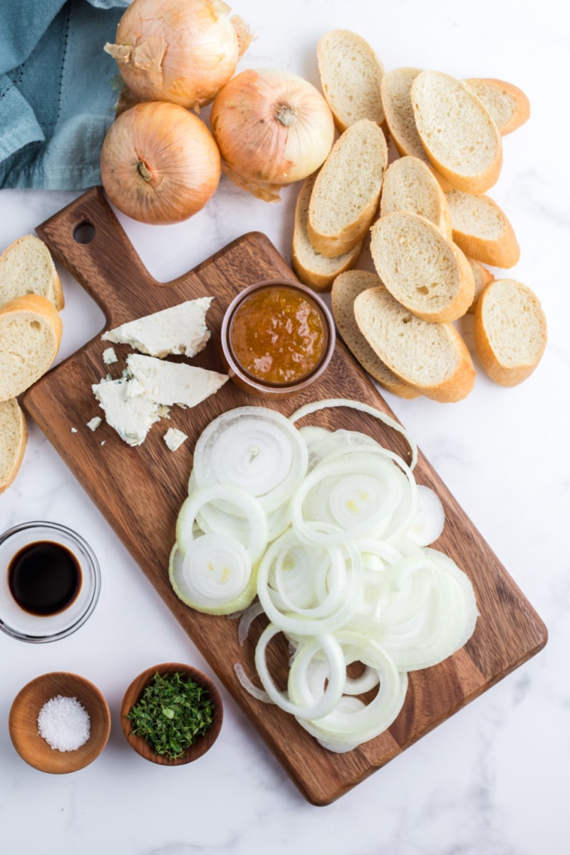 ingredients displayed for making crostini with gorgonzola caramelized onions and fig jam