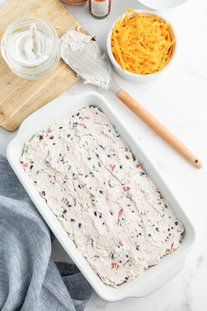 creamy cheese layer spread into dish for dip recipe