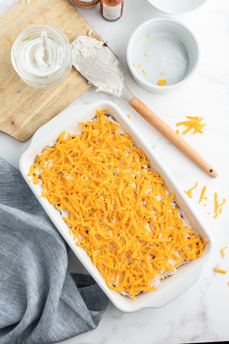 dip in white casserole dish ready for oven