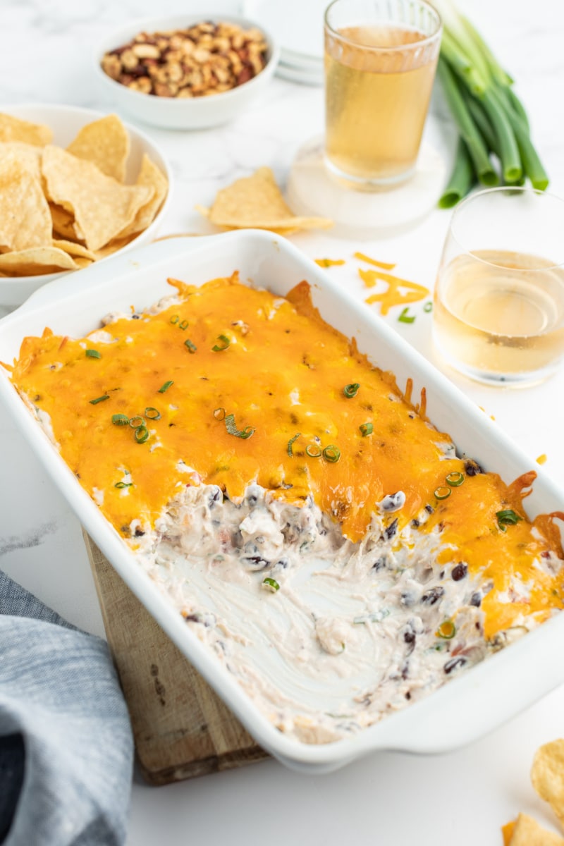 cheesy dip in a casserole dish half gone