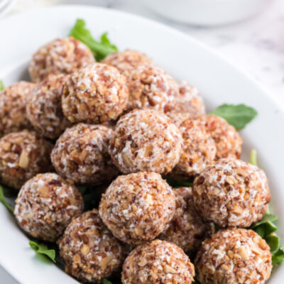 goat cheese truffles stacked on a platter