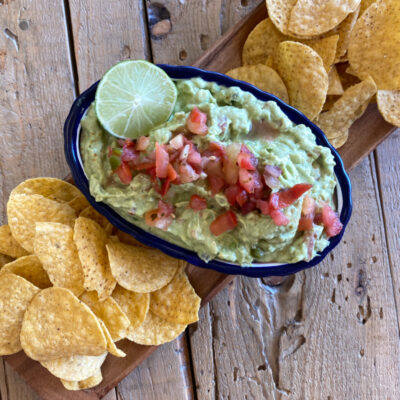 guacamole in a bowl with chips