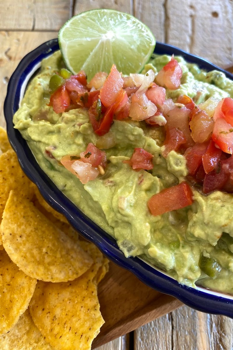 guacamole in a bowl with chips