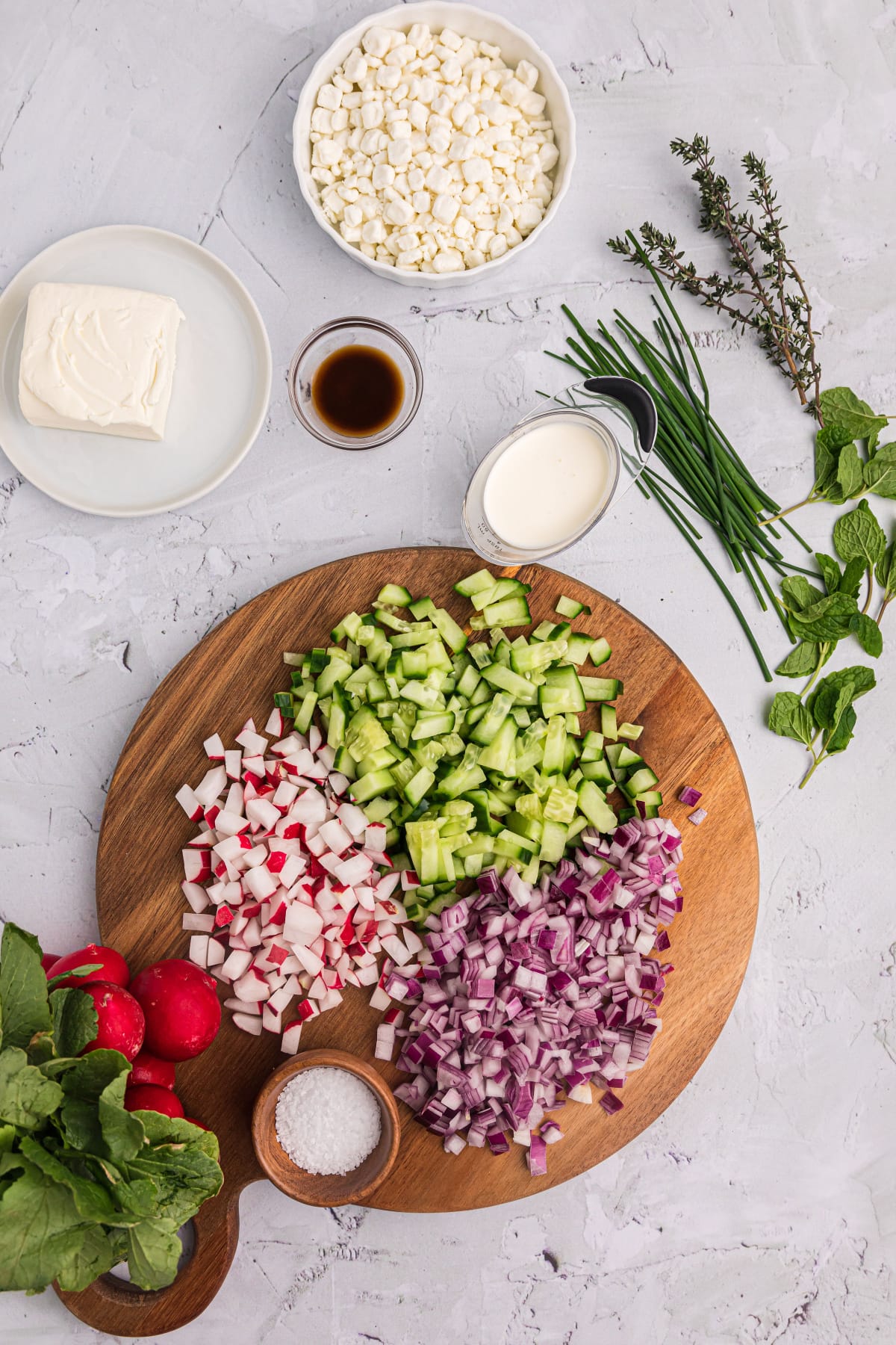 ingredients displayed for making vegetable goat cheese spread