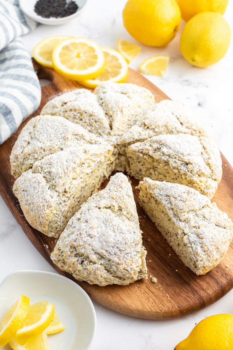 lemon poppy seed scones on a board pulled apart