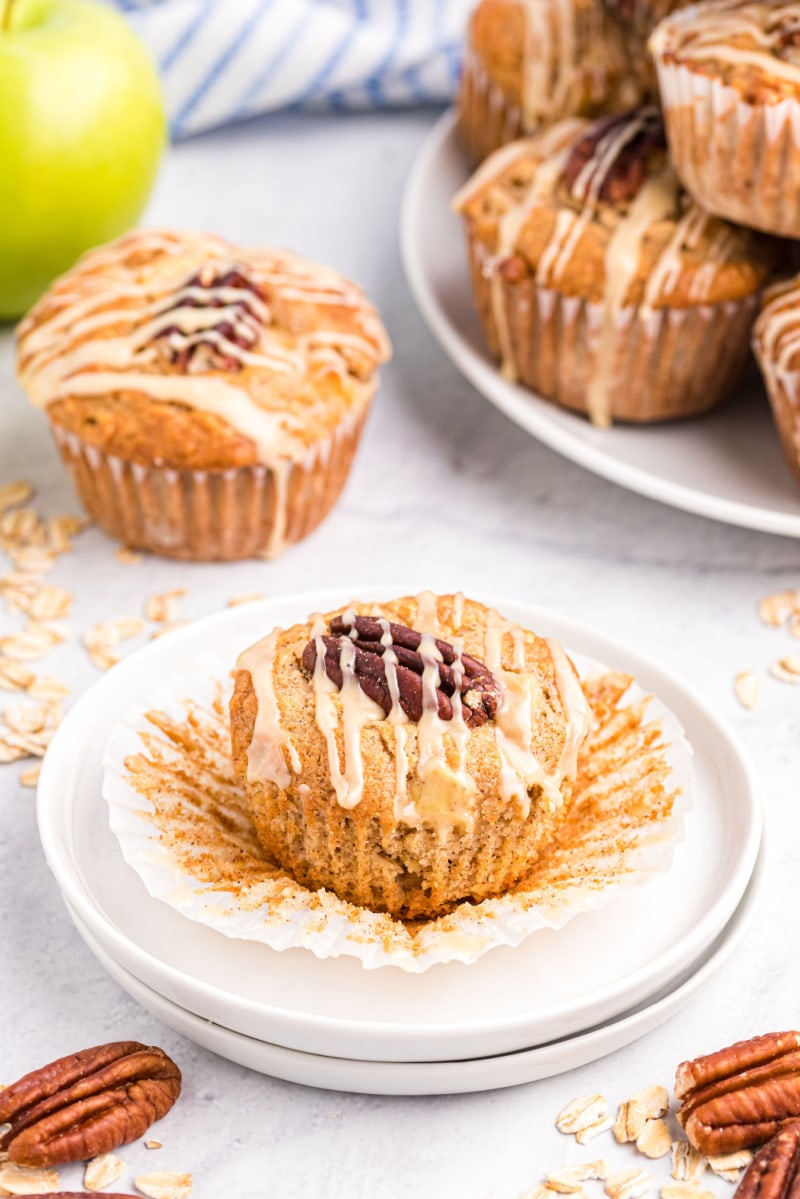 unwrapped apple muffin on a plate