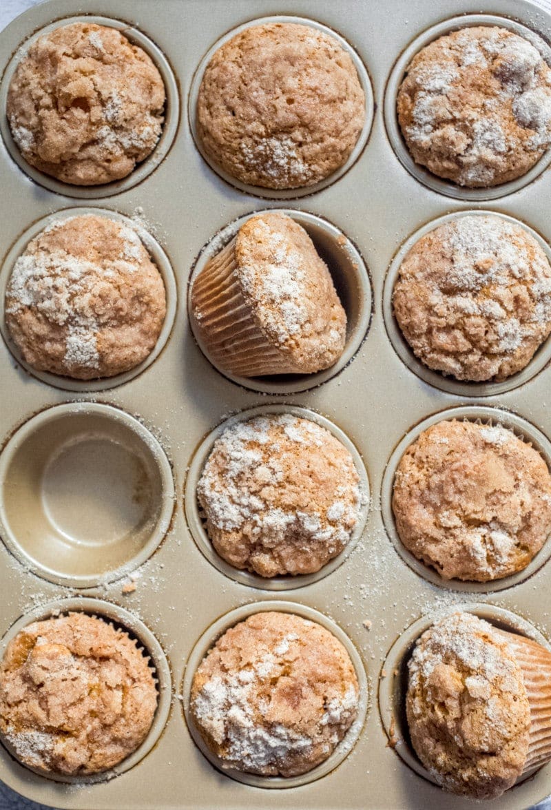 Pumpkin Apple Streusel Muffins in a muffin tin