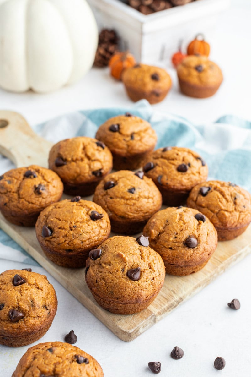 pumpkin chocolate chip muffins on a cutting board