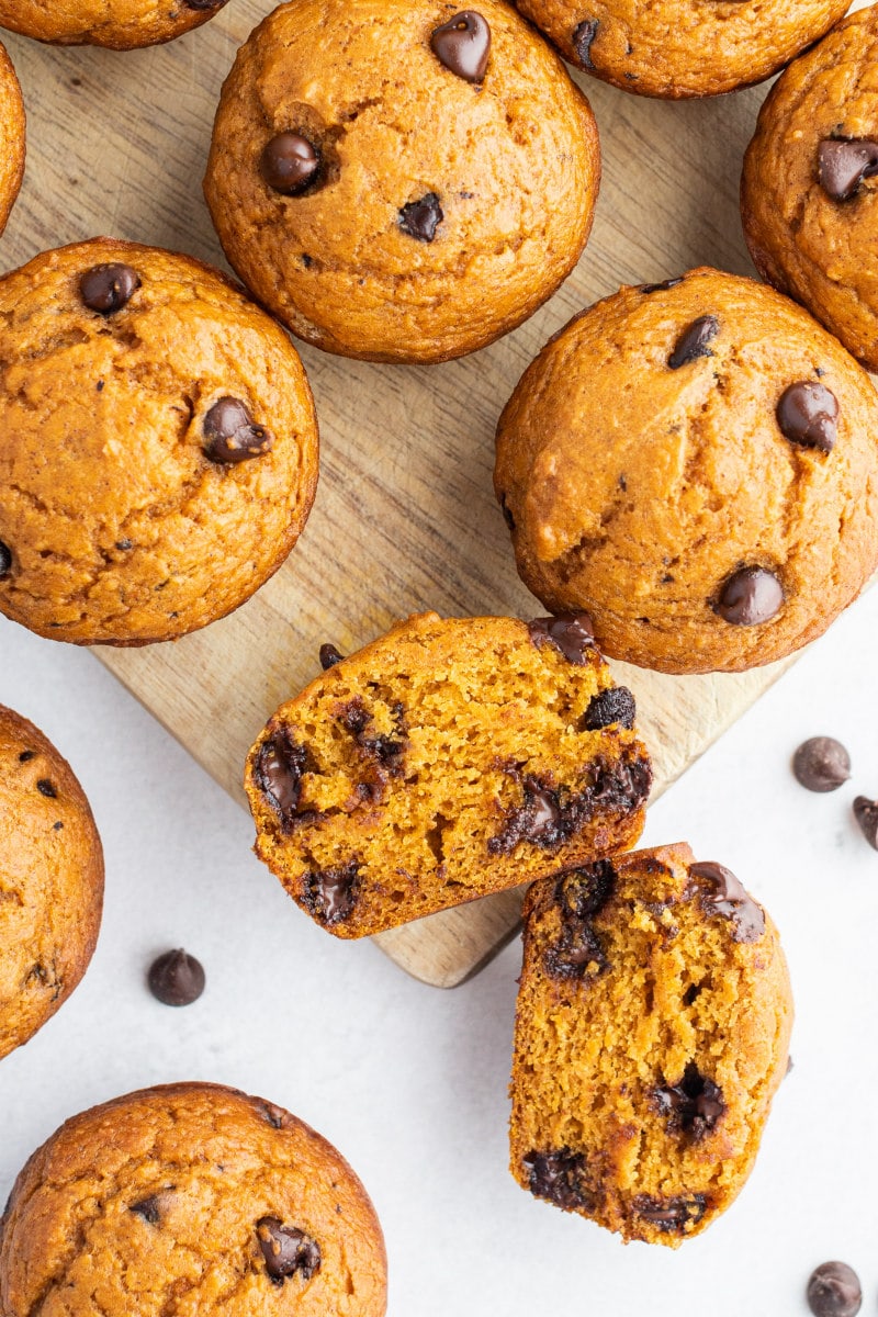 pumpkin chocolate chip muffins on a cutting board