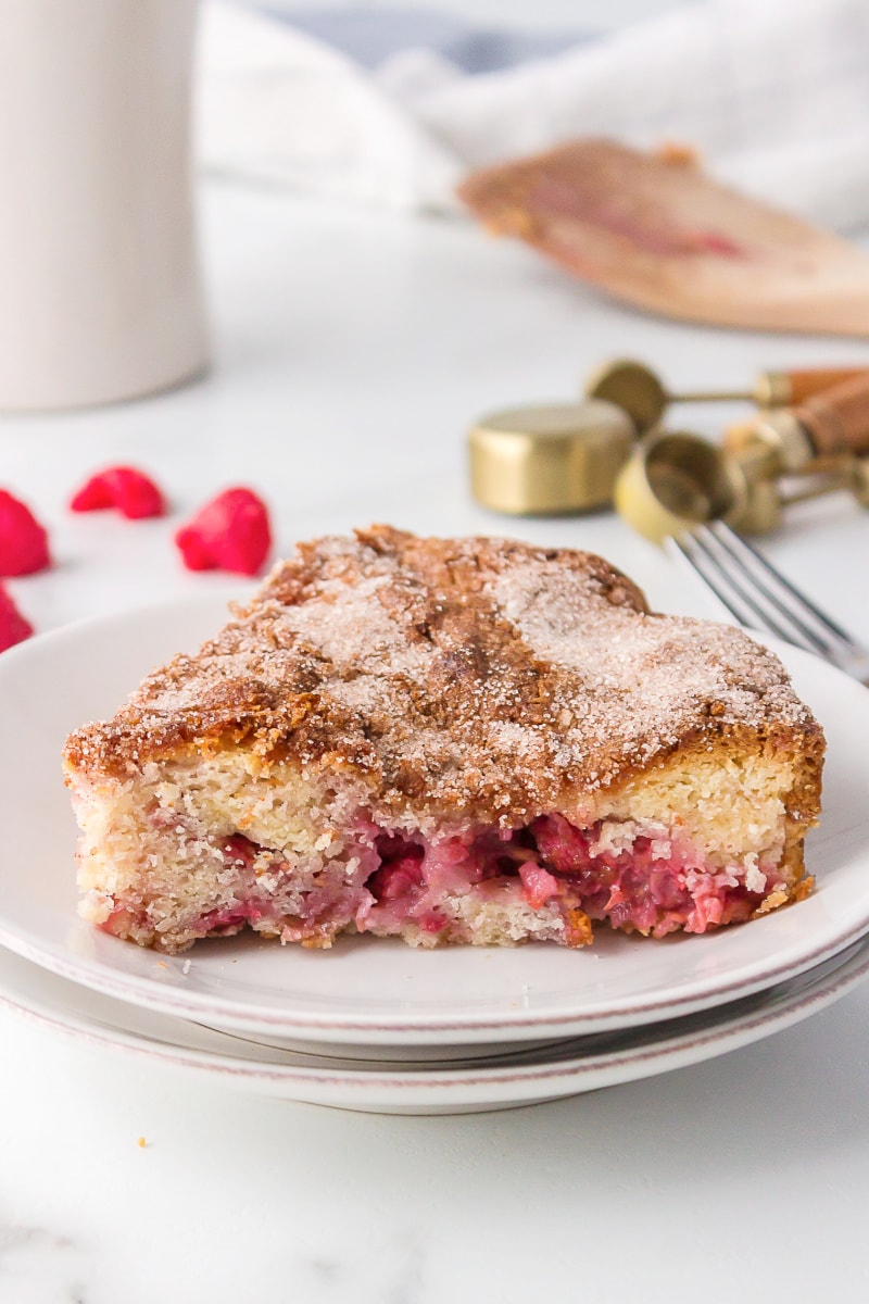 slice of raspberry coffee cake on white plate