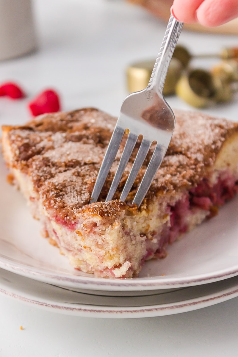 fork poking into slice of coffee cake