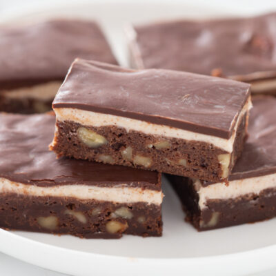 cappuccino brownies displayed on white plate