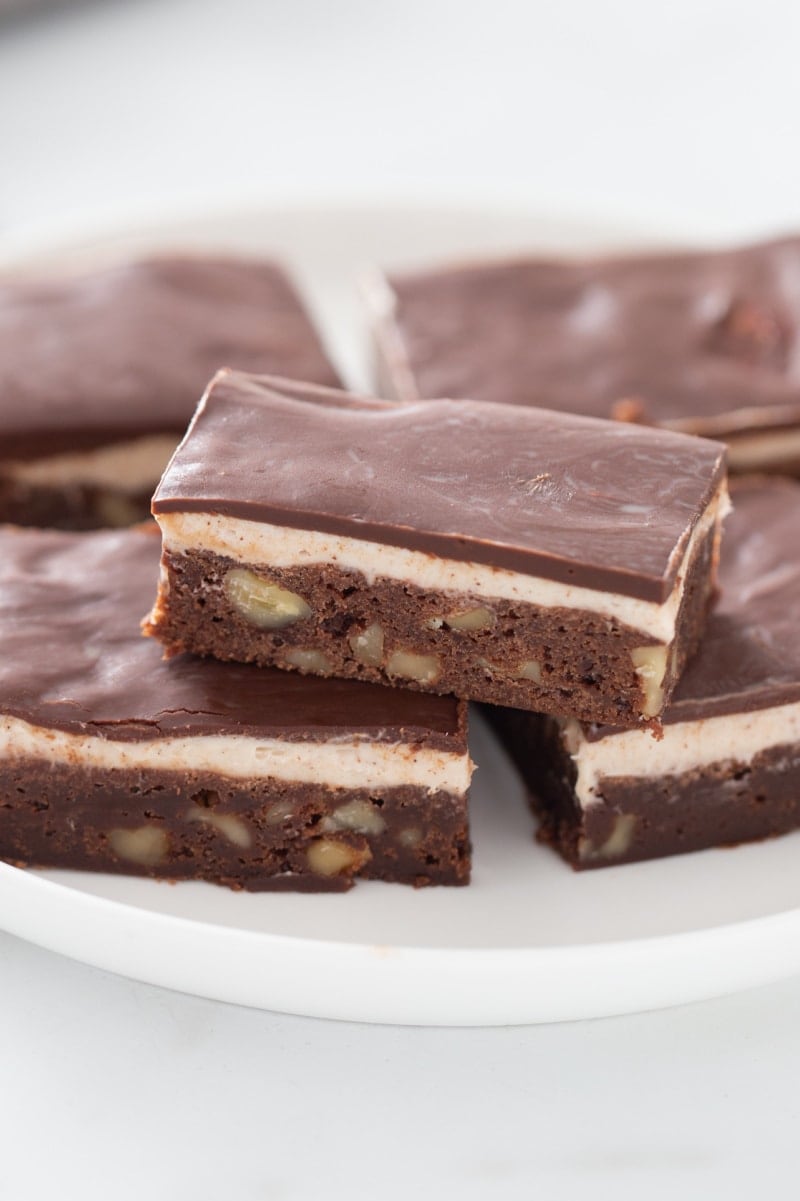 cappuccino brownies displayed on white plate