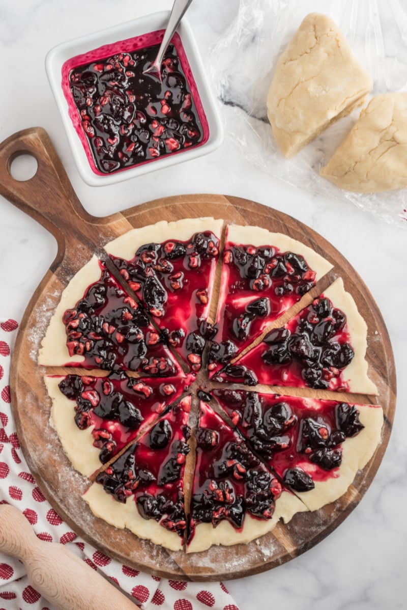 cherries spread onto rugelach dough