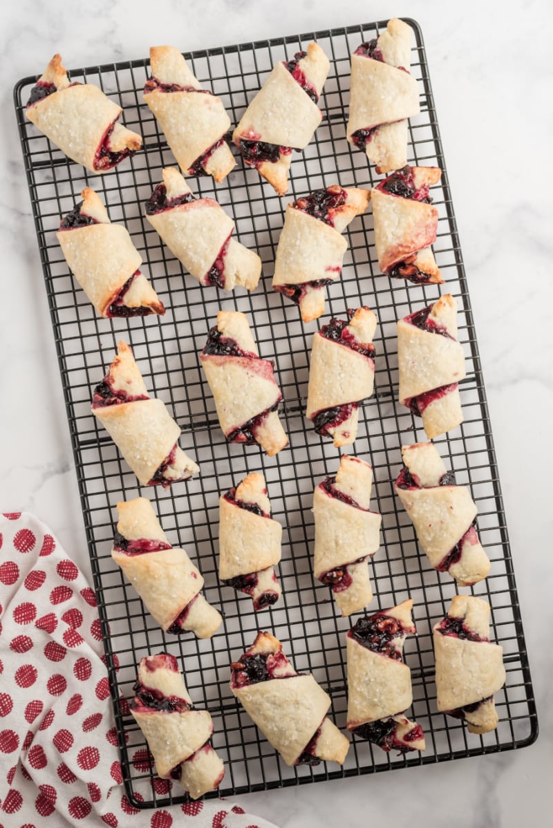 cherry rugelach on a cooling rack