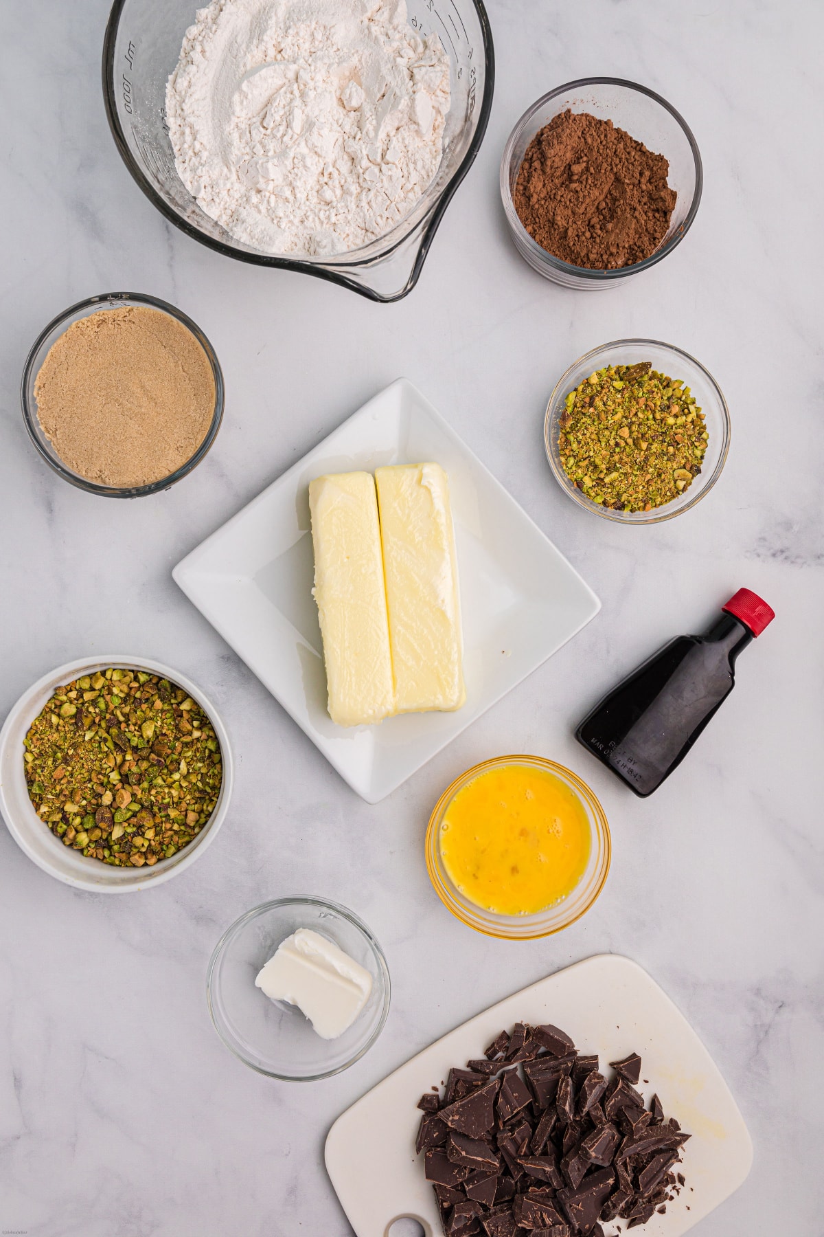 ingredients displayed for making chocolate pistachio cut out cookies