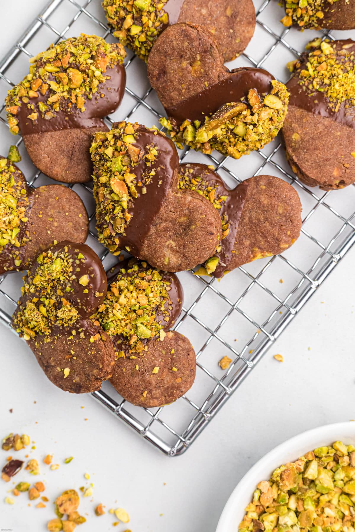 chocolate heart cookies dipped in chocolate and pistachio