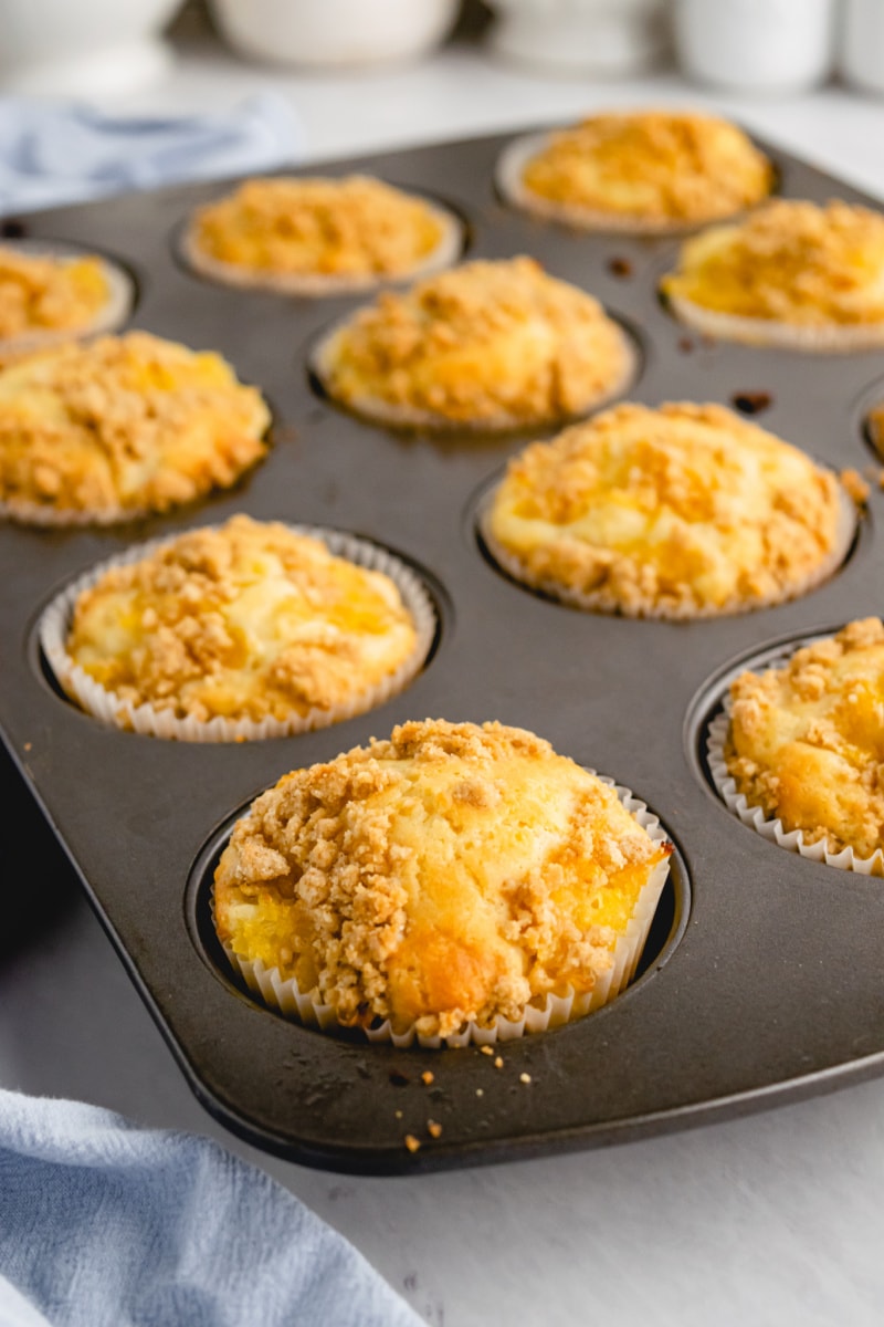 pineapple muffins in a muffin pan