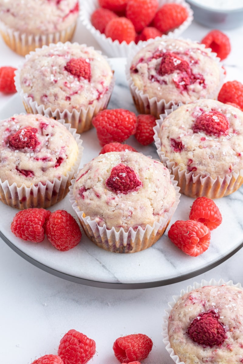 sugar crusted raspberry muffins on a serving tray