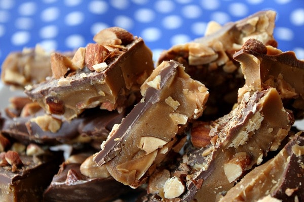 almond roca with blue and white polka dot napkin in the background