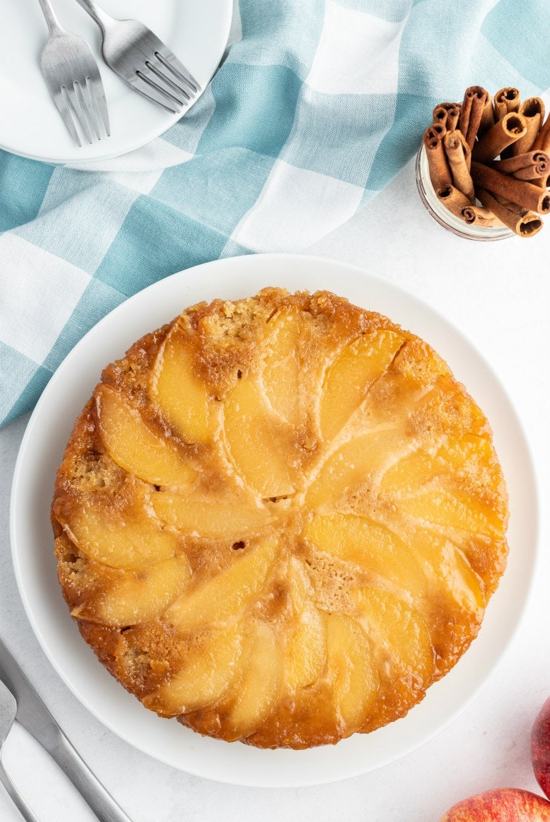 apple cinnamon upside down cake on white plate