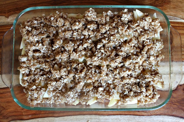 apple crisp in a pyrex pan ready for the oven