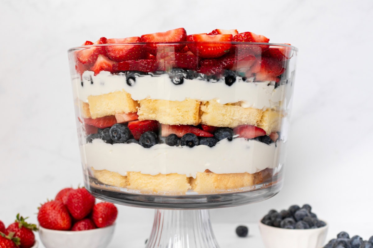 Layered Berry Trifle recipe from RecipeGirl.com : summer berry trifle side shot of berry trifle in trifle dish