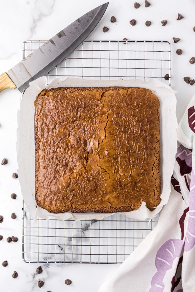 slab of baked brownies on a cooling rack