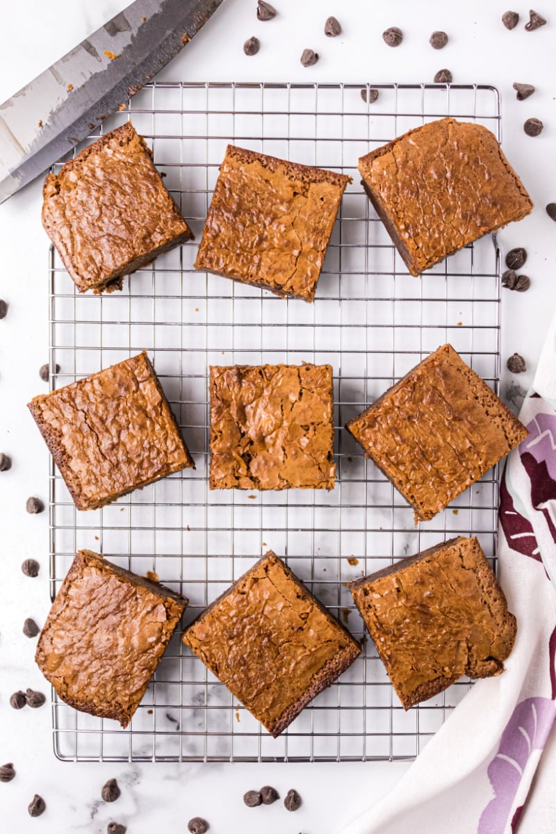 brownie squares on a cooling rack