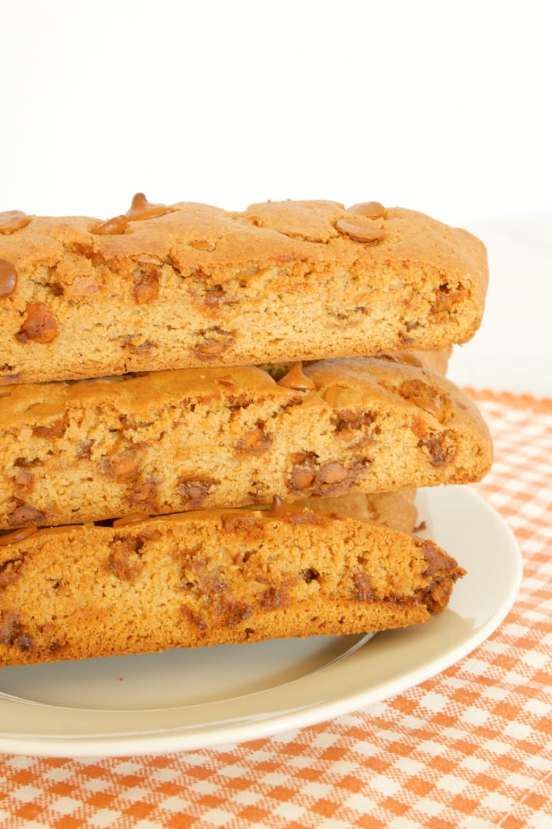 three biscotti stacked on plate