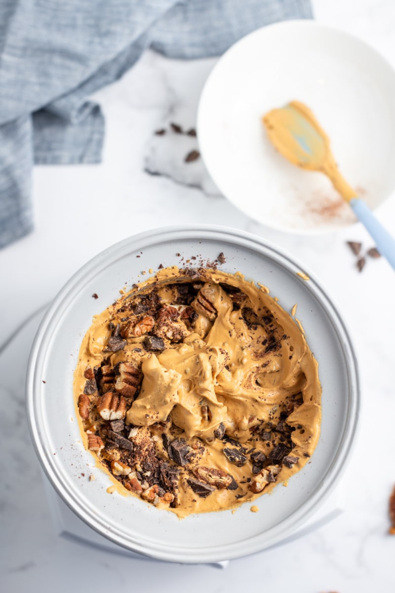 caramel chocolate nut ice cream in an ice cream maker