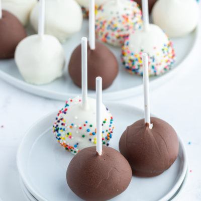cheesecake pops displayed on plates