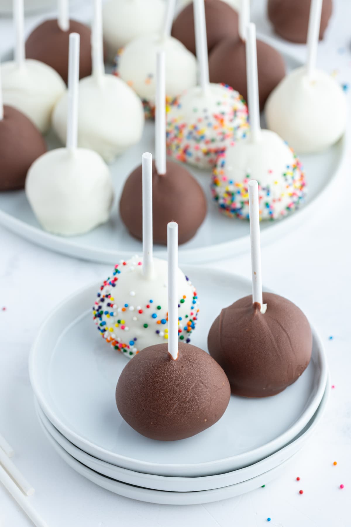 cheesecake pops displayed on plates