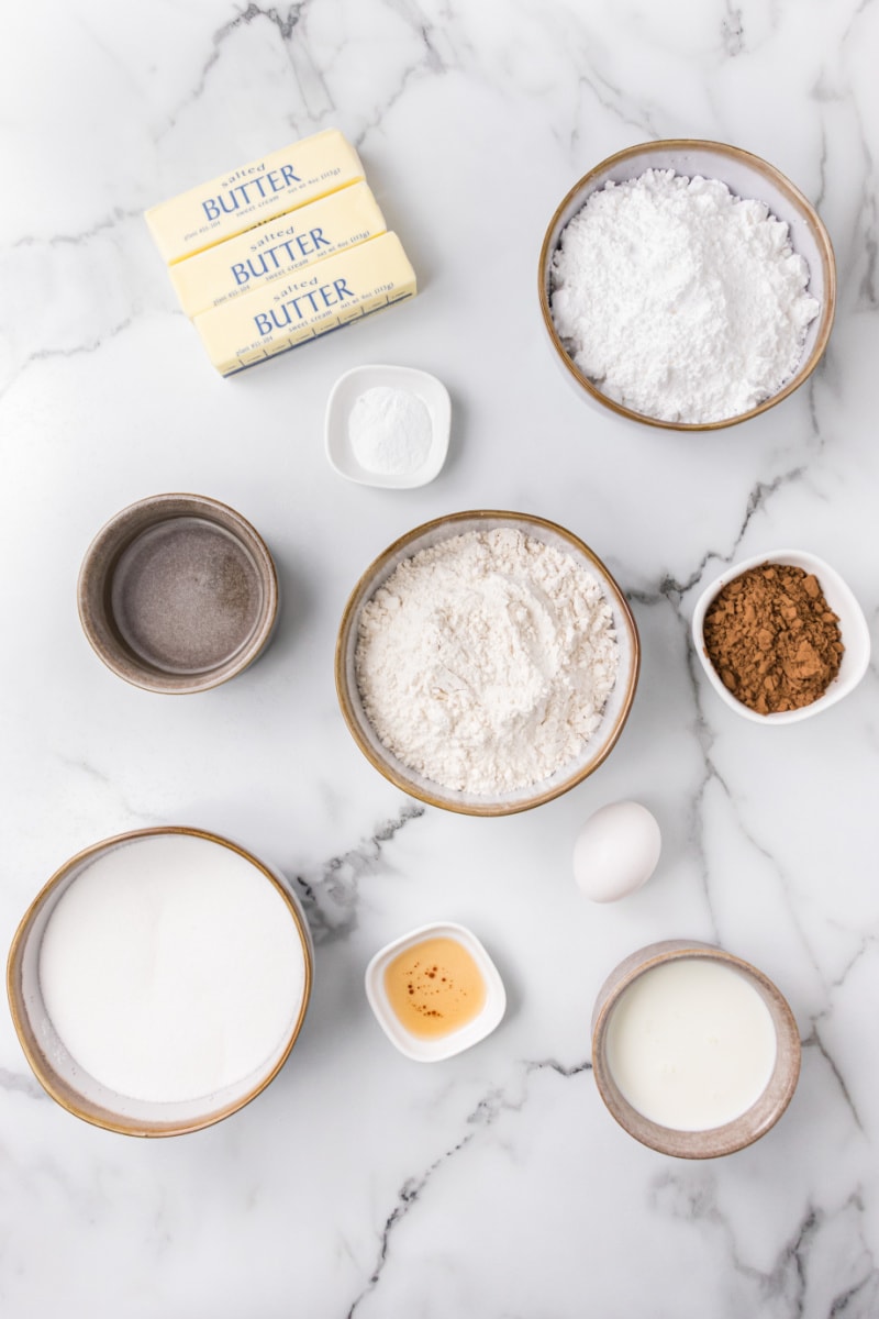 ingredients displayed for making chocolate glazed cake