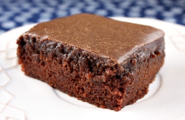 slice of chocolate cake on a white plate