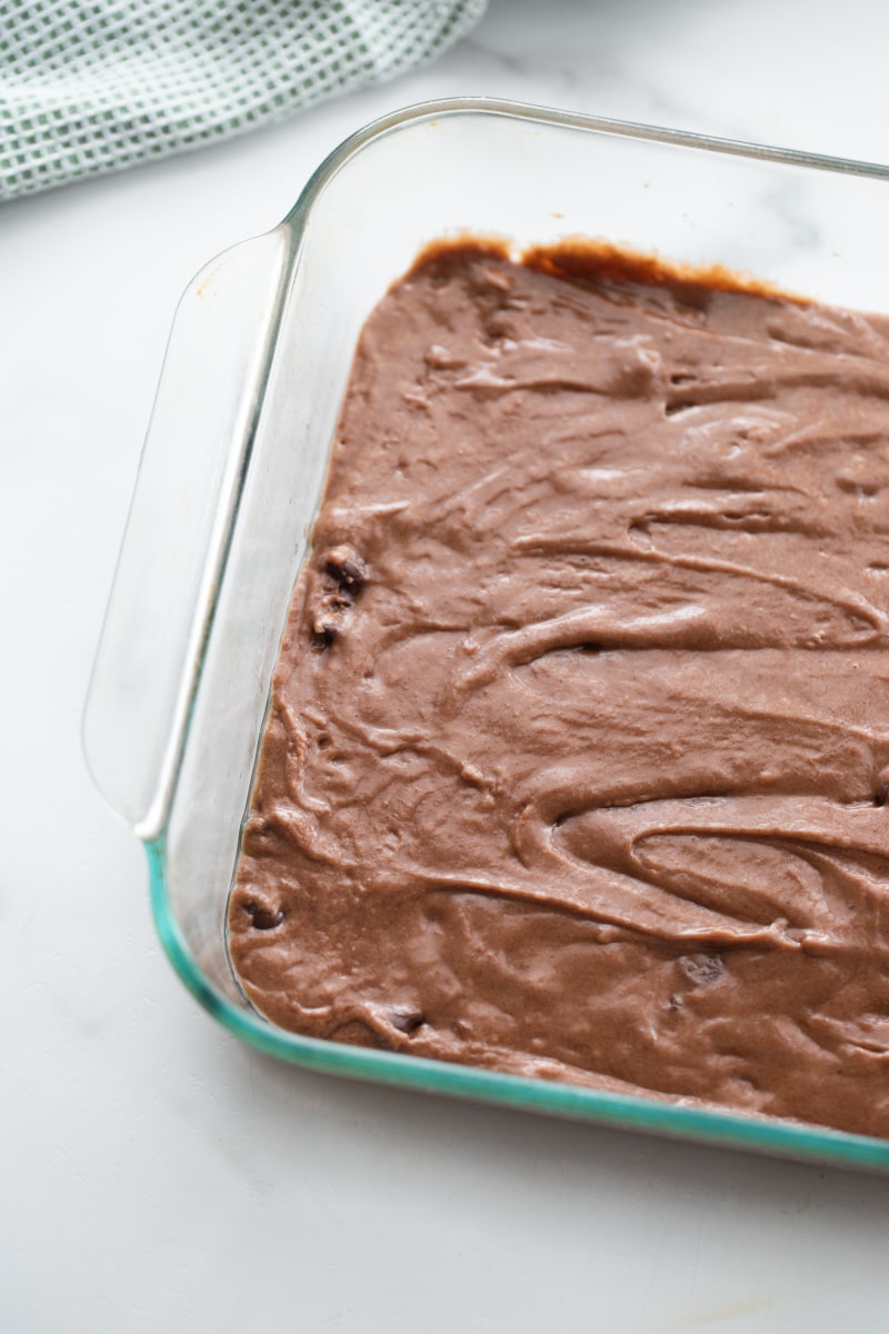 chocolate cake batter in pan