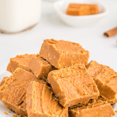pieces of cinnamon fudge stacked on a platter