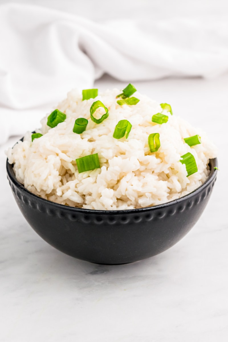 coconut rice in a brown bowl