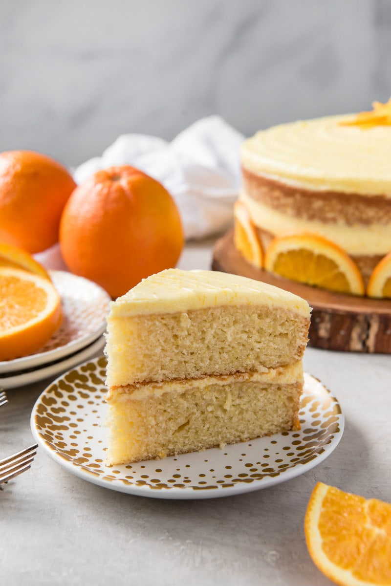 slice of fresh orange layer cake