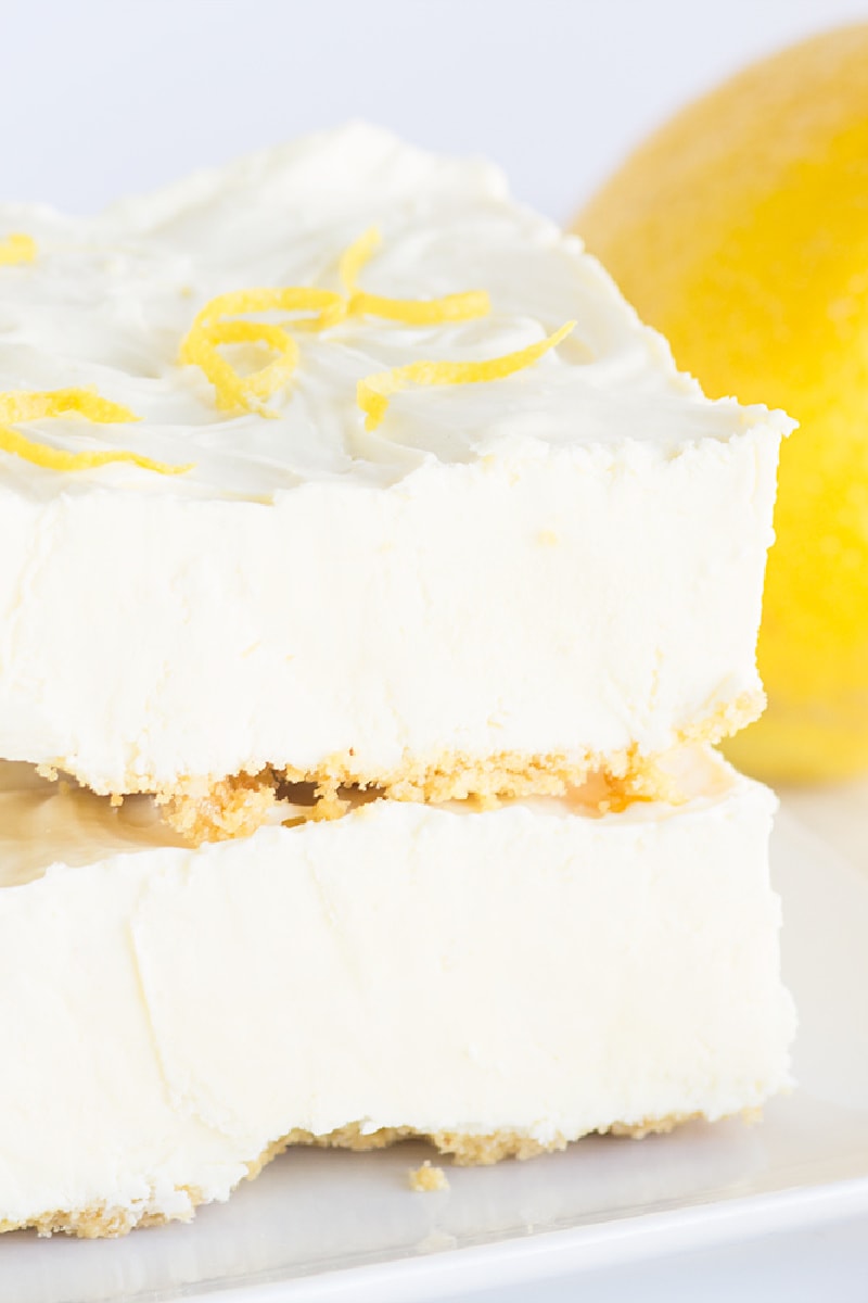 two frozen lemon cheesecake squares stacked