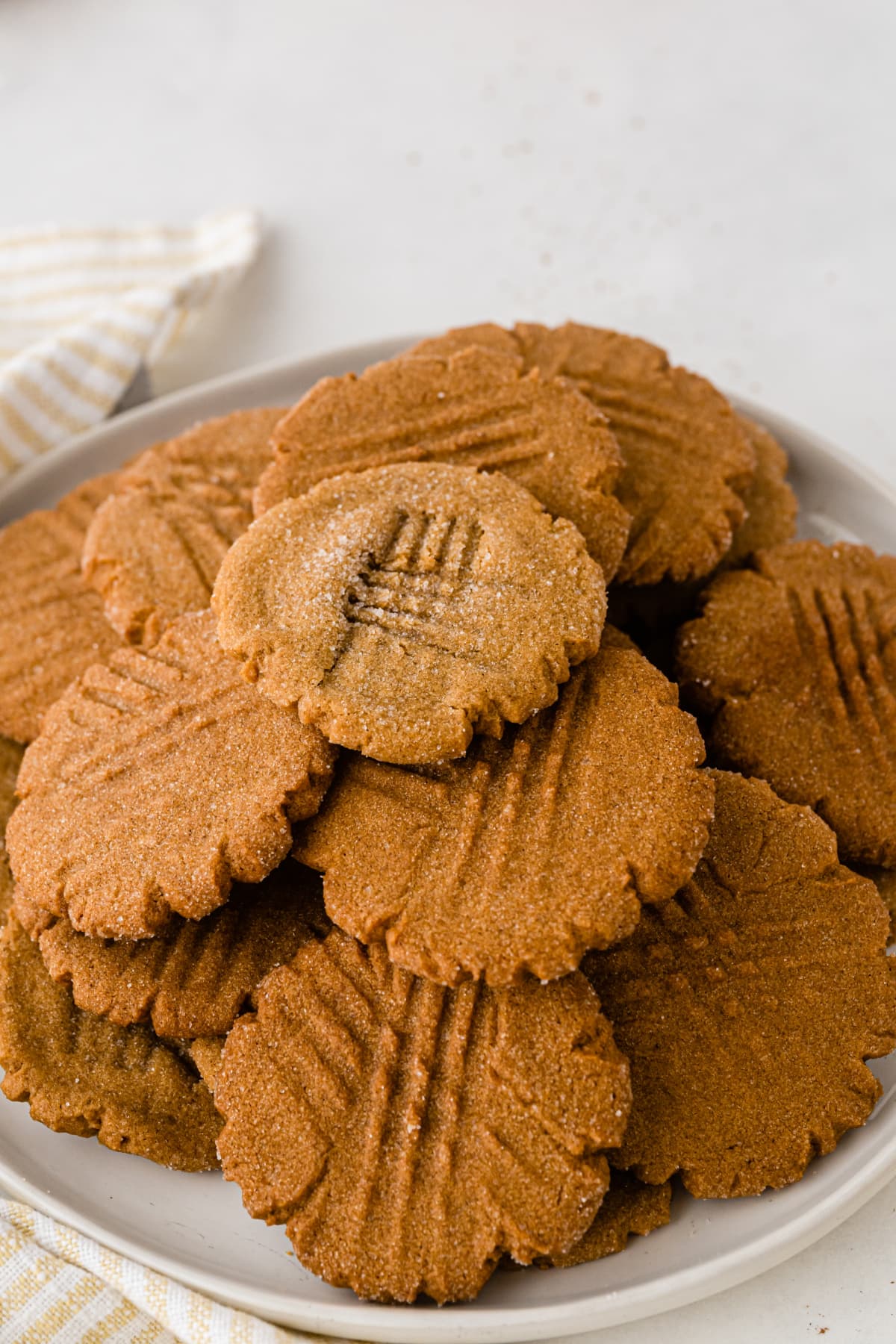 platter of stacked ginger cookies