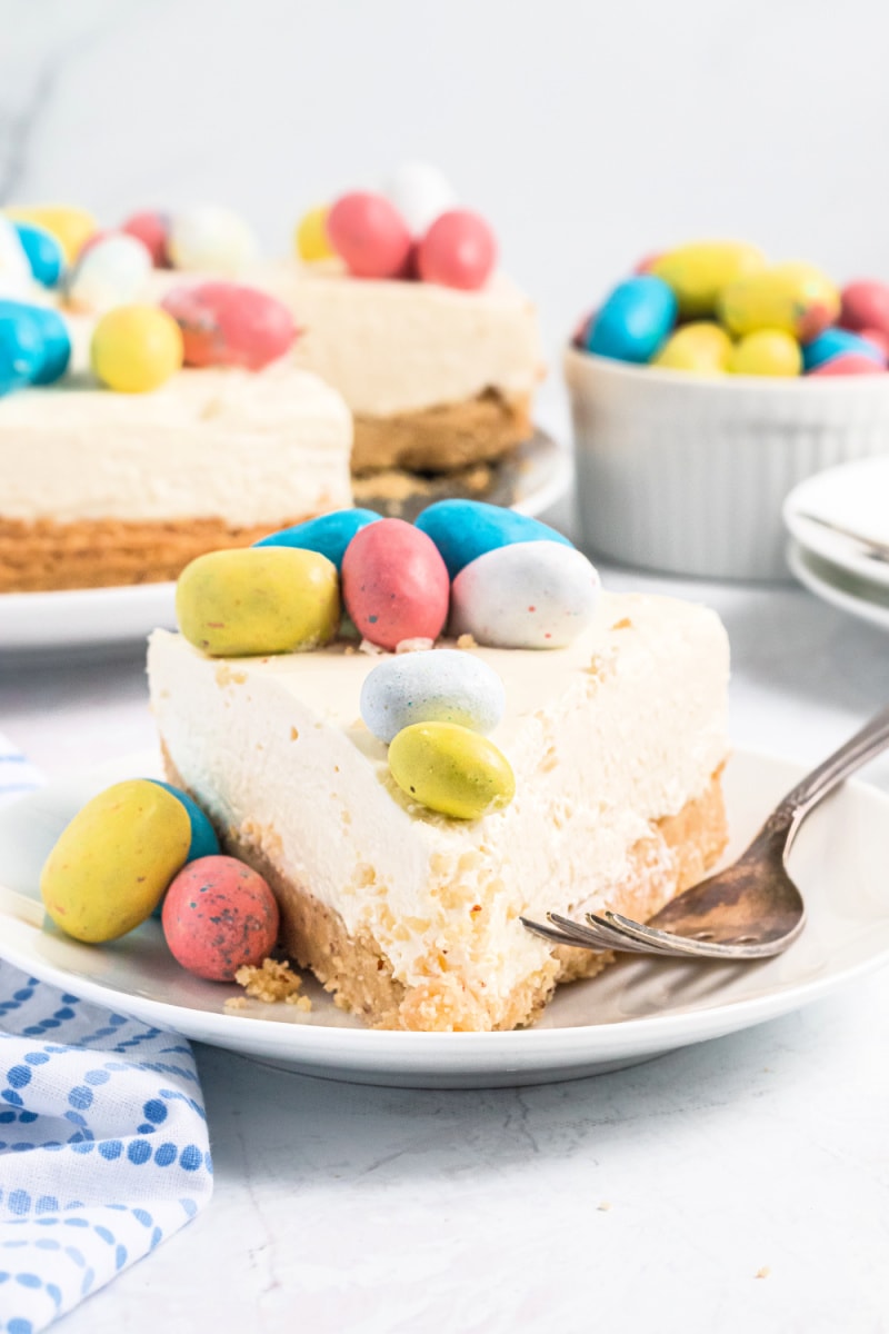 slice of malted mousse cake topped with easter eggs