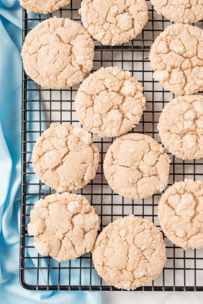 maple snickerdoodles on a baking rack