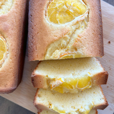 loaf of meyer lemon loaf cake sliced
