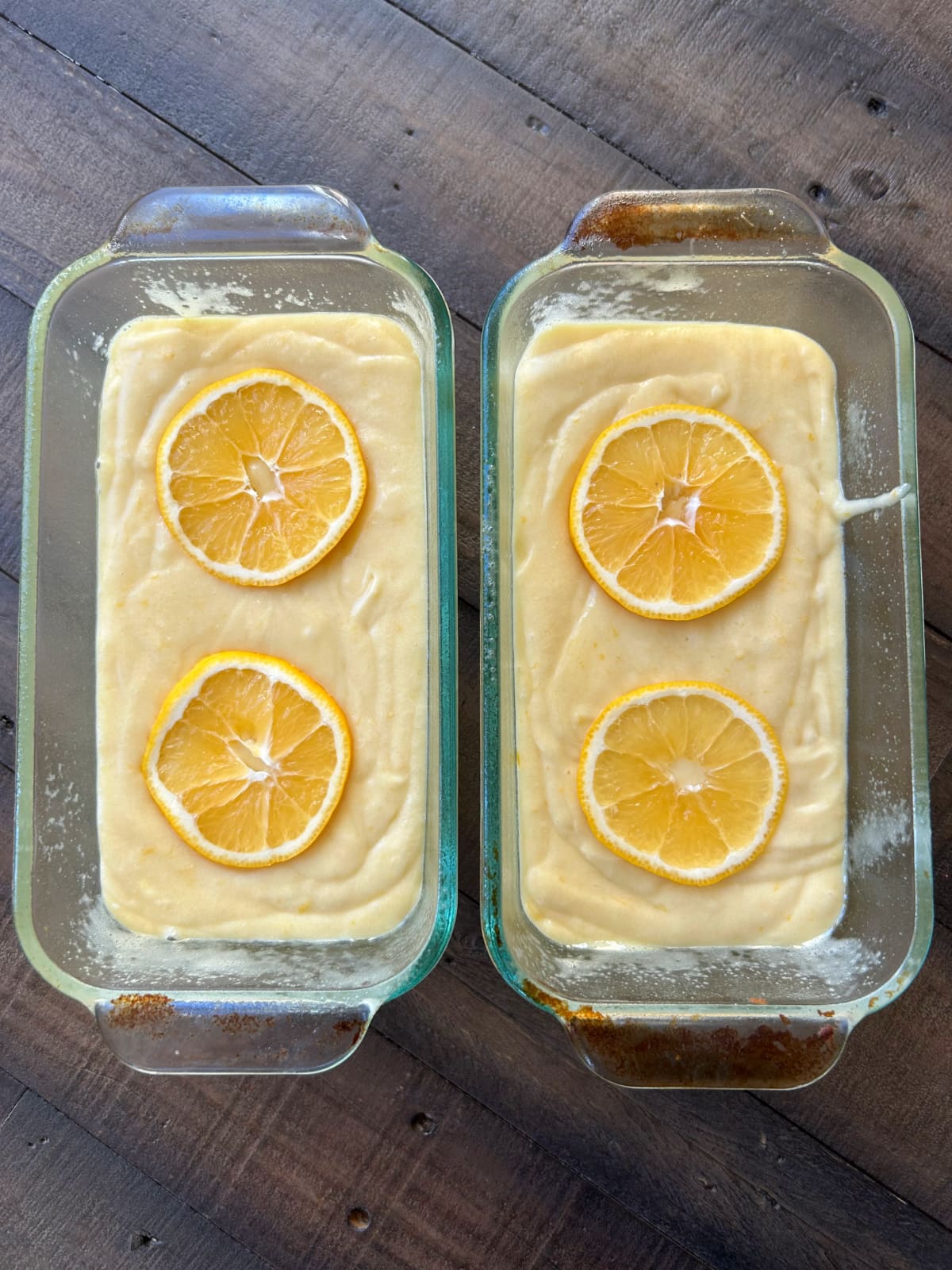 two meyer lemon loaf cakes ready for oven