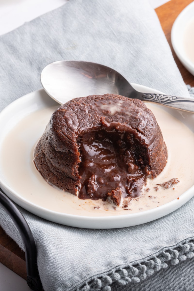 molten chocolate cake on plate with chocolate gushing out