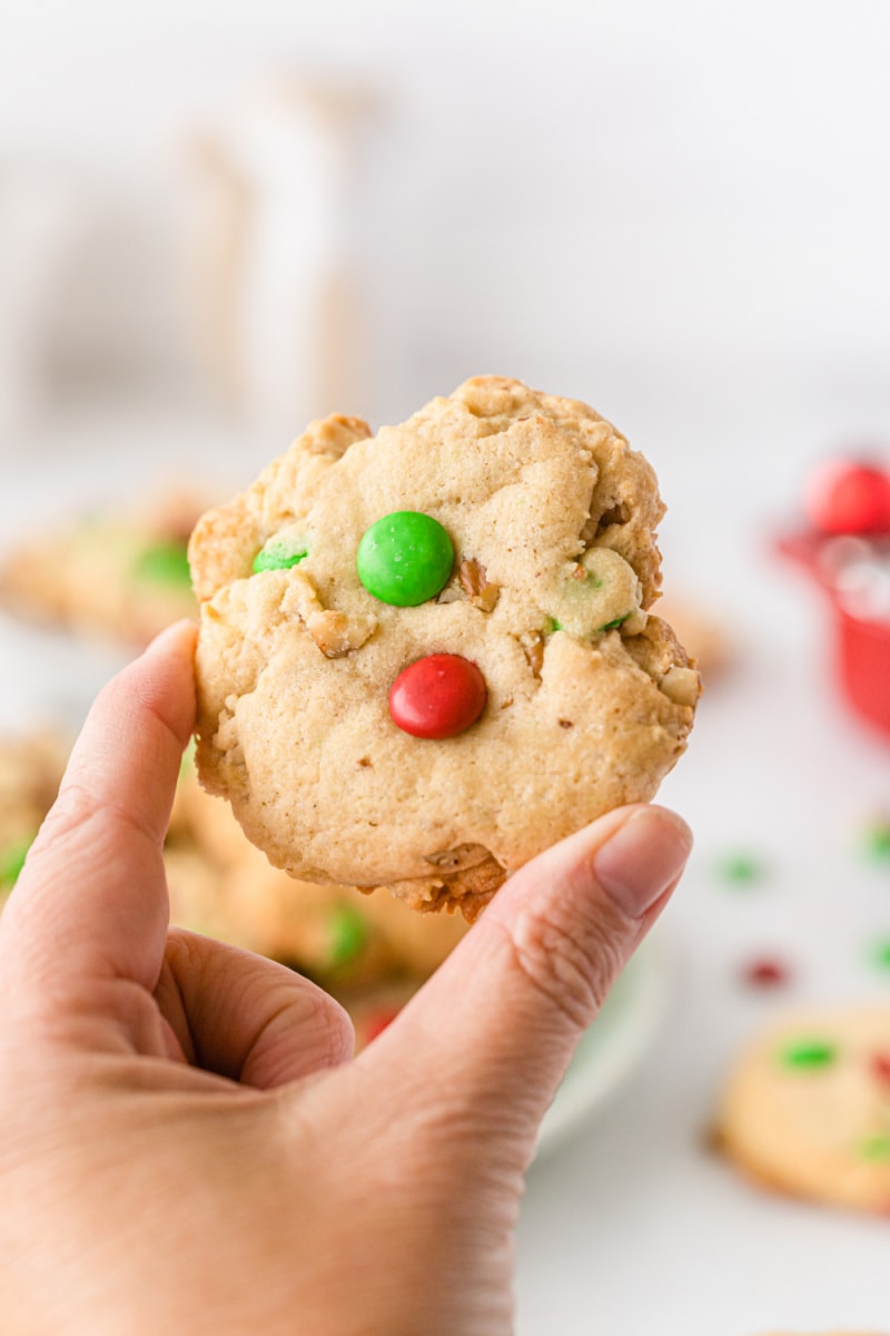 hand holding m&M cookie