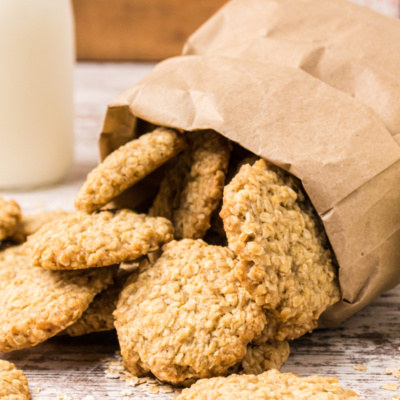 oatmeal cookies coming out of a paper bag
